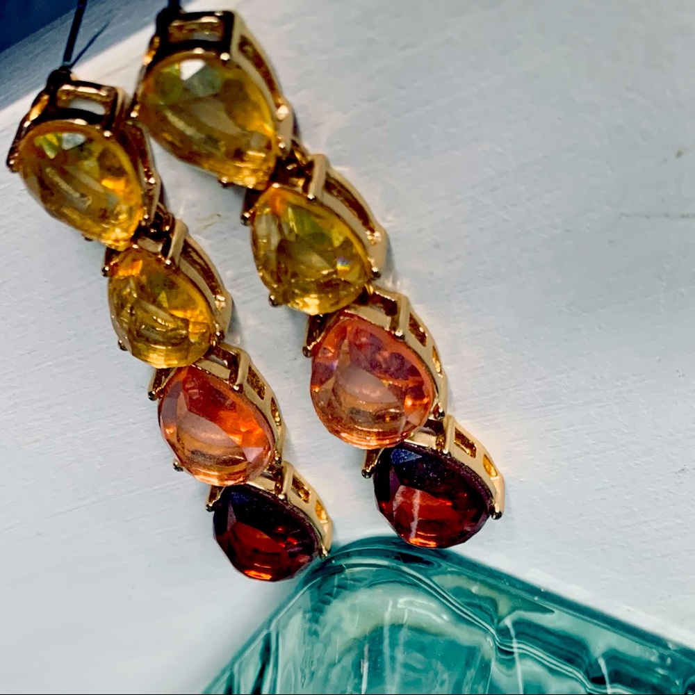 Express, long teardrop lightweight earrings.